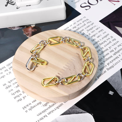 RYQEN Geometric Chain Bracelet Two - Tone Geometric Chain Bracelet Luxury twisted chain accessory Statement bracelet for fashion lovers