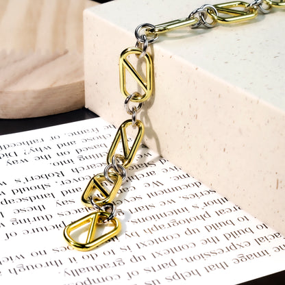 RYQEN Geometric Chain Bracelet Two - Tone Geometric Chain Bracelet Luxury twisted chain accessory Statement bracelet for fashion lovers